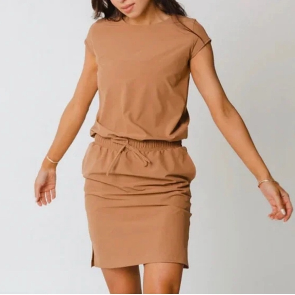 Never worn! “Going Places” dress by Albion Fit in tan.